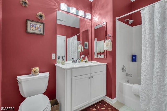 full bathroom featuring vanity, tile patterned flooring, toilet, and shower / bath combo with shower curtain