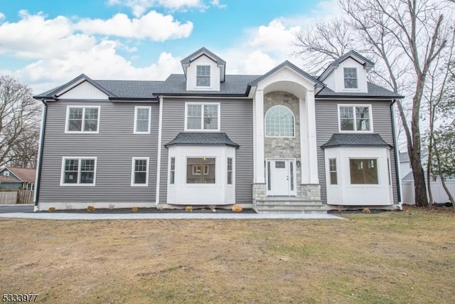 view of front facade with a front lawn