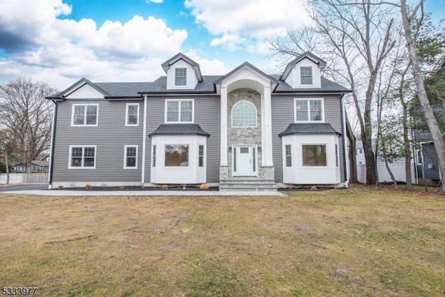 view of front of home featuring a front lawn