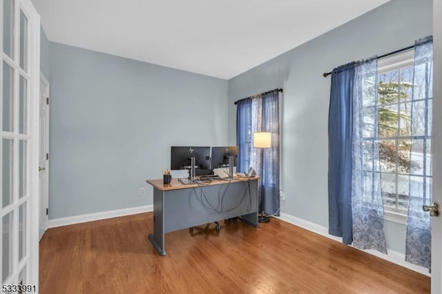 office space featuring hardwood / wood-style floors