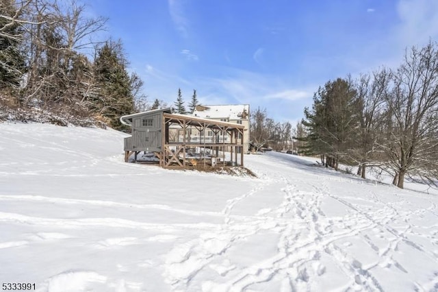 view of yard layered in snow