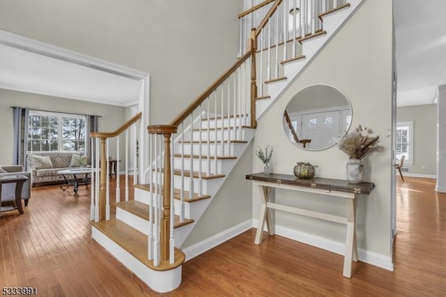 stairs with wood-type flooring