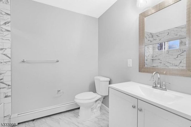 bathroom featuring vanity, a baseboard heating unit, a tile shower, and toilet