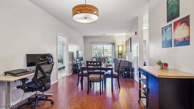 interior space featuring dark wood-type flooring