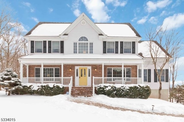 colonial-style house with a porch