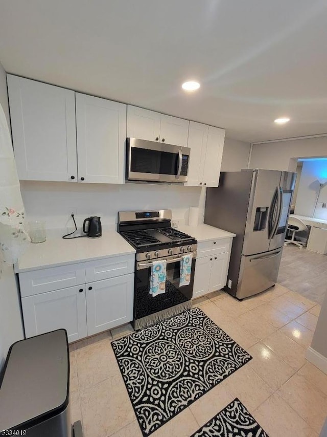 kitchen with white cabinets and stainless steel appliances