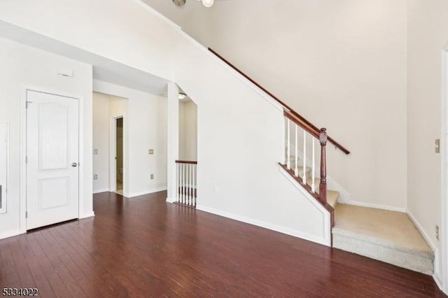 interior space with dark wood-type flooring