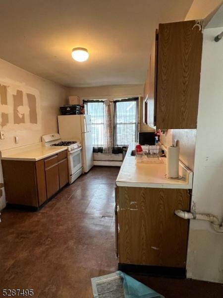 kitchen featuring white gas range oven