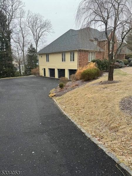 view of home's exterior with a garage