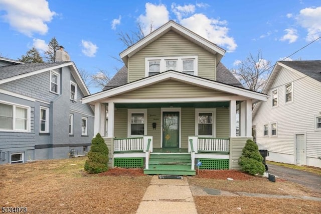 bungalow-style home with covered porch