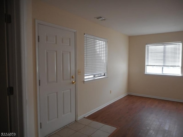 entrance foyer featuring light hardwood / wood-style floors