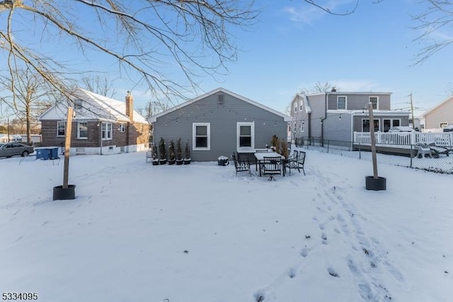 view of snow covered house