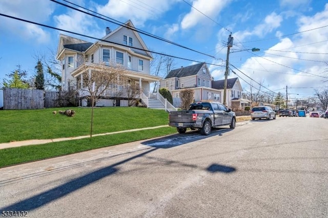 view of front of home with a front lawn