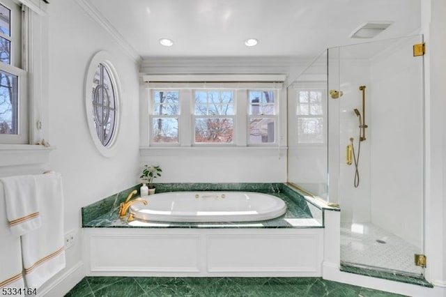 bathroom with ornamental molding, independent shower and bath, and a wealth of natural light