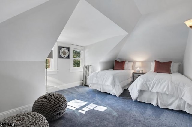 bedroom featuring lofted ceiling, dark colored carpet, and radiator heating unit