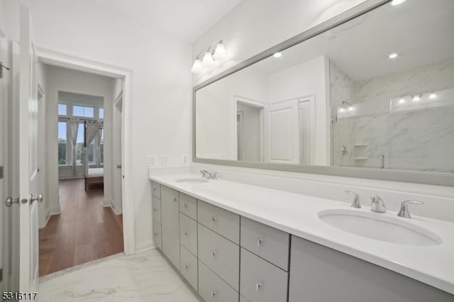 bathroom featuring vanity and walk in shower