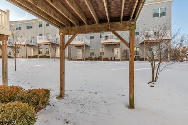 view of yard layered in snow