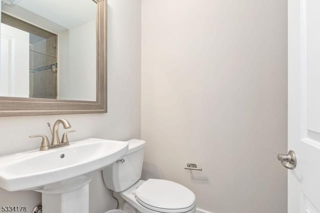 bathroom with sink and toilet