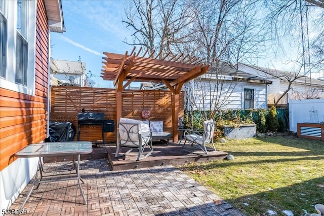 view of patio / terrace featuring area for grilling, fence, and a pergola