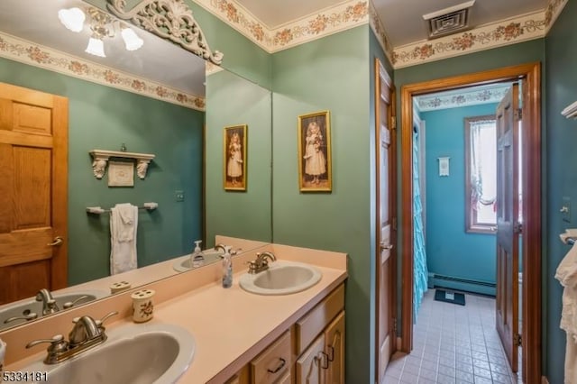 bathroom featuring vanity and a baseboard radiator