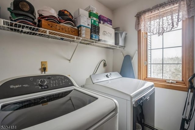 laundry area with separate washer and dryer