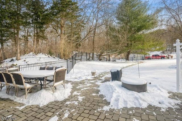 view of yard covered in snow