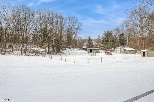 view of yard layered in snow