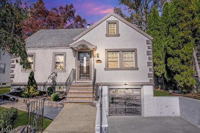 view of front of home featuring a garage