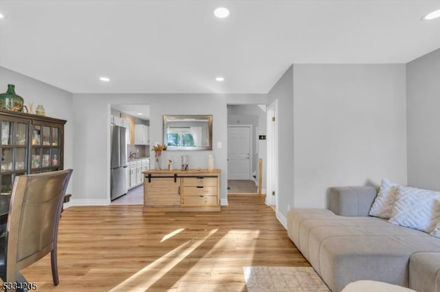 living room featuring light hardwood / wood-style floors