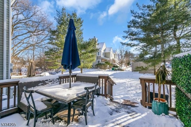 view of snow covered deck