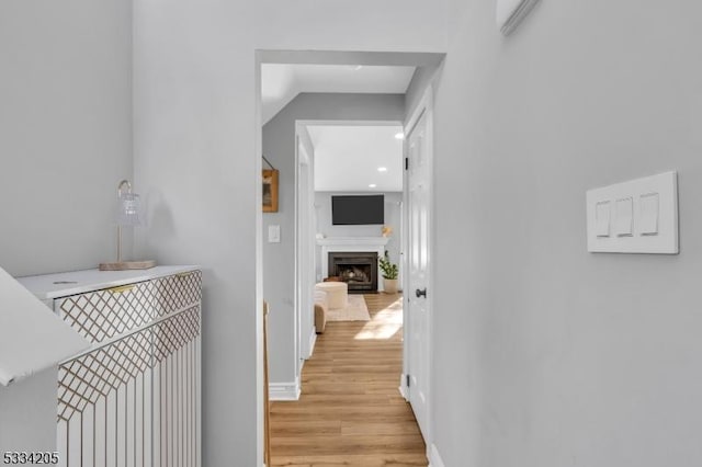 corridor featuring light hardwood / wood-style floors