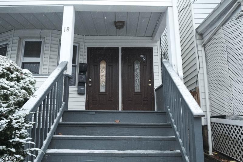 18 Thomas St, Bloomfield Twp, NJ 07003 - view of snow covered property entrance