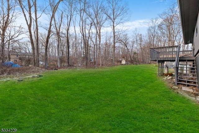 view of yard with a deck