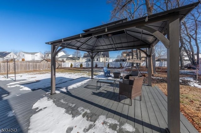 snow covered deck with a gazebo