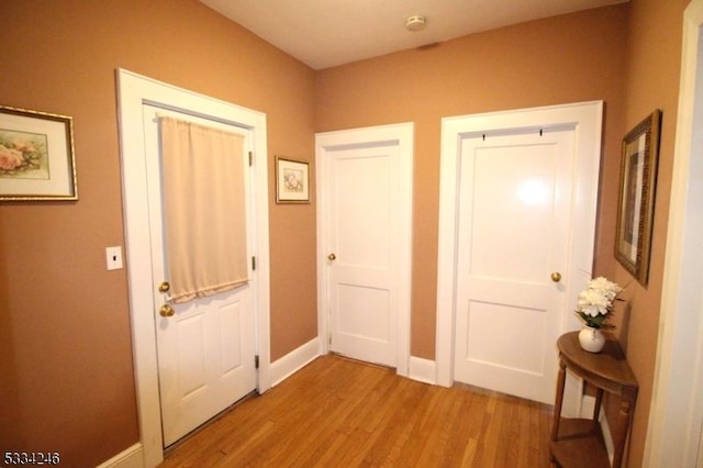 doorway featuring hardwood / wood-style flooring