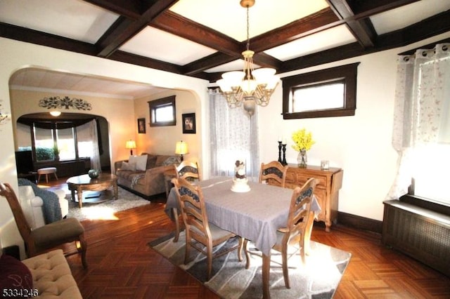 dining area featuring beamed ceiling, dark parquet flooring, coffered ceiling, and a notable chandelier