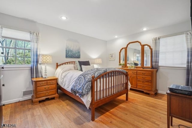 bedroom featuring light wood-type flooring