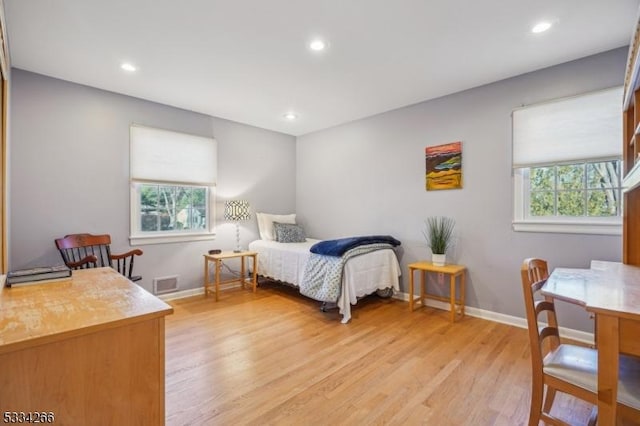 bedroom featuring light hardwood / wood-style floors