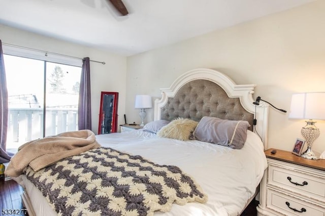 bedroom with ceiling fan, wood-type flooring, and access to exterior