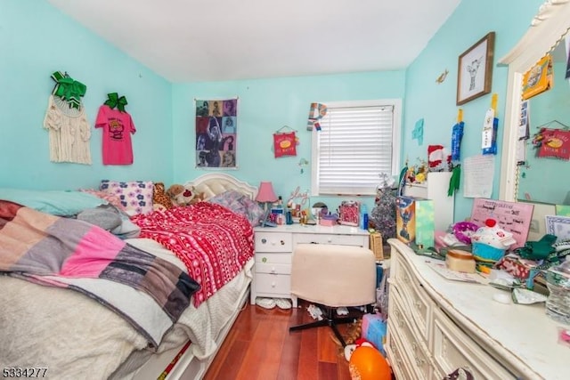 bedroom featuring hardwood / wood-style floors