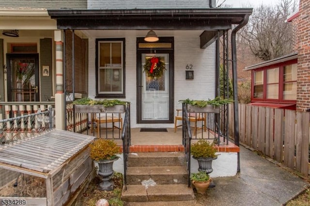 doorway to property with a porch