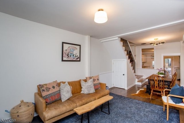 living room with dark wood-type flooring