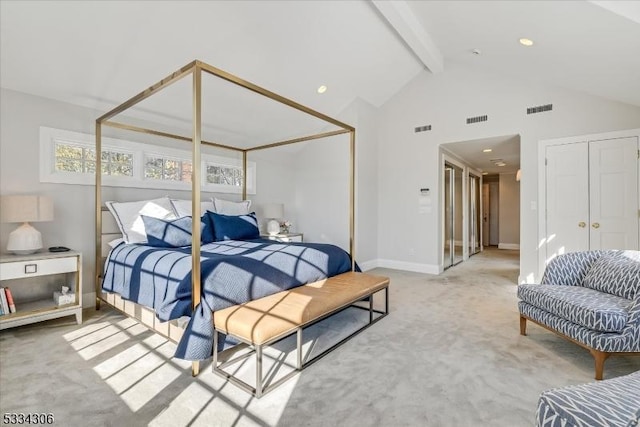 carpeted bedroom featuring beamed ceiling, high vaulted ceiling, and a closet