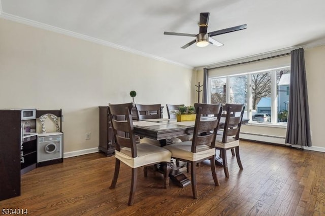 dining area with a baseboard heating unit, crown molding, dark wood-type flooring, and ceiling fan