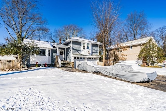 tri-level home featuring a garage