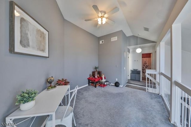 recreation room featuring lofted ceiling, ceiling fan, and carpet