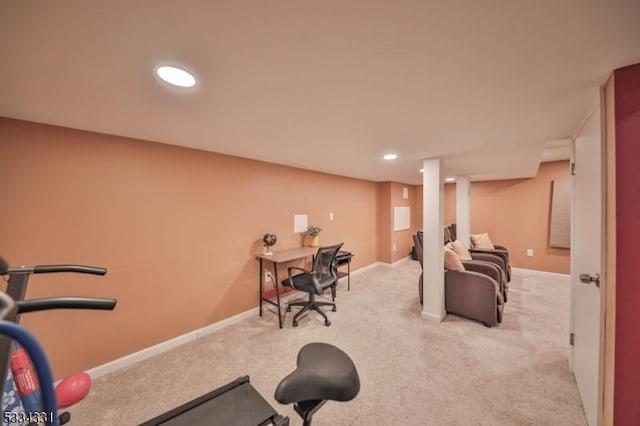 exercise room with light colored carpet