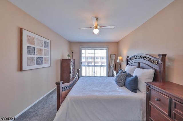 bedroom with ceiling fan, dark carpet, and access to outside