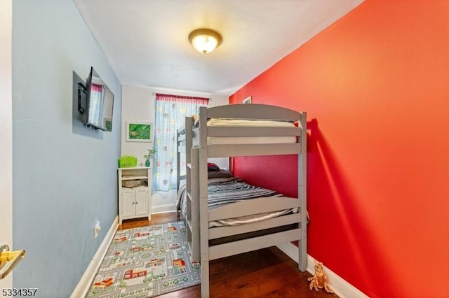 bedroom featuring hardwood / wood-style floors