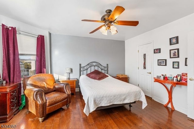 bedroom featuring wood-type flooring and ceiling fan